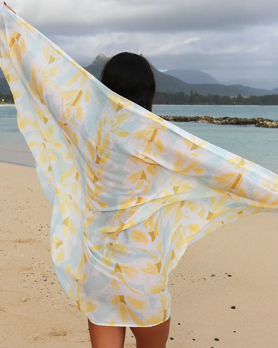 Plumeria Lei on Blue Pareo